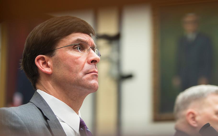 Defense Secretary Mark Esper attends a hearing on Capitol Hill in Washington on Feb. 26, 2020. Esper said on Tuesday, March 17, that U.S. troops were likely in a good position to avoid serious individual consequences if they contracted the coronavirus. He also said that the Pentagon will provide 5 million respirator masks and 2,000 specialized ventilators to federal heath authorities.