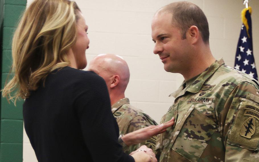 Medal of Honor recipient Matthew Williams gets promoted to sergeant major by his wife during a ceremony at Fort Bragg, N.C., on Feb. 28, 2020.