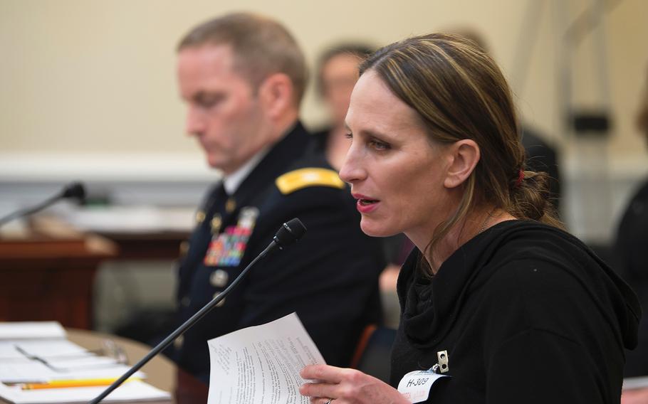 Linne Gherdovich testifies before the House Appropriations Subcommittee on Military Construction during a hearing on Capitol Hill in Washington on Tuesday, March 3, 2020. The spouse of an Air Foce colonel stationed at Joint Base Anacostia-Bolling and the mother of six children, Gherdovich pleaded with committee members to listen to her account of alleged mistreatment related to base housing. At left is Army Col. Scott Gerber who also testified of unacceptable housing conditions at Fort Meade, Md.