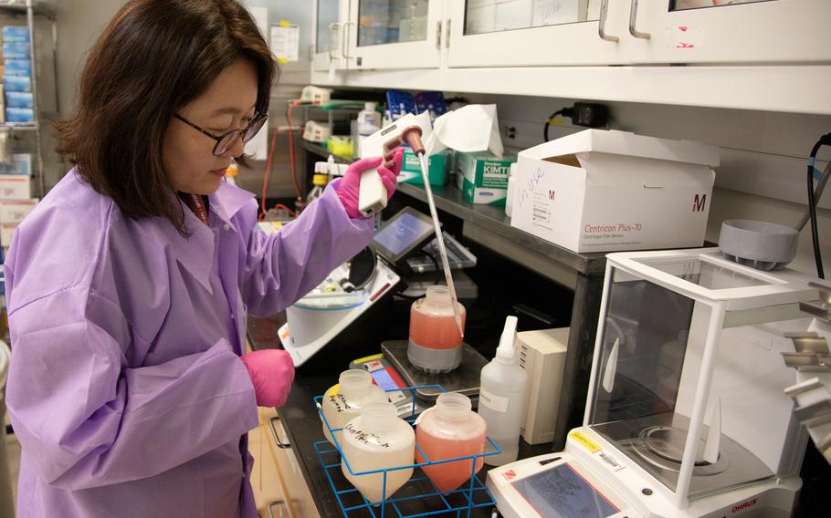 Misook Choe, a Laboratory Manager with the Emerging Infectious Disease branch at the Walter Reed Army Institute of Research, conducts studies in order to find a solution for the Coronavirus, March 3, 2020. The Emerging Infectious Diseases branch, established in 2018, has the explicit mission to survey, anticipate and counter the mounting threat of emerging infectious diseases of key importance to U.S. forces in the homeland and abroad.