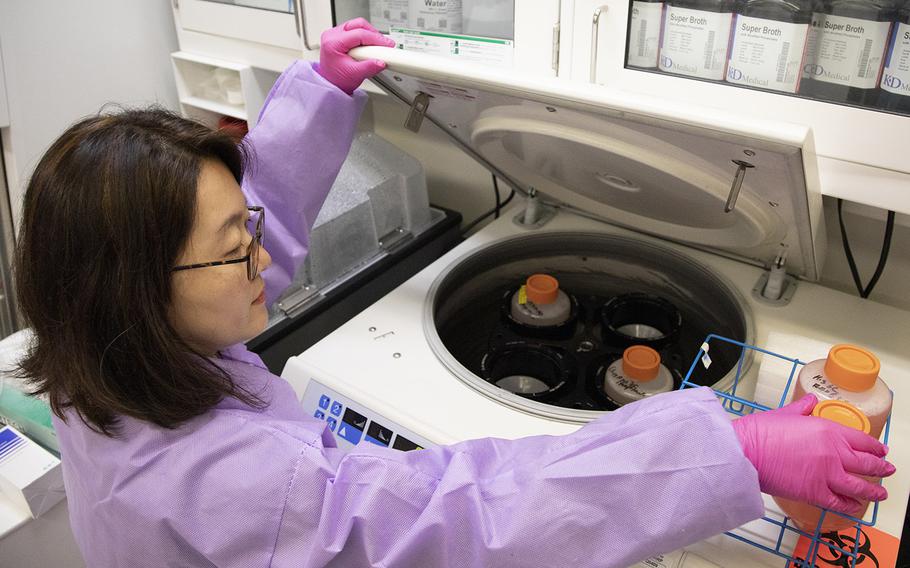 Misook Choe, a Laboratory Manager with the Emerging Infectious Disease branch at the Walter Reed Army Institute of Research, conducts studies aimed at finding a solution for the coronavirus, March 3, 2020.