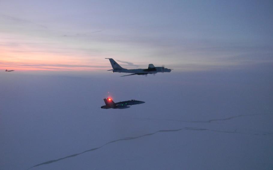 North American Aerospace Defense Command F-22s, CF-18s intercepted two Russian Tu-142 maritime reconnaissance aircraft entering the Alaskan Air Defense Identification Zone on Monday, March 9, 2020.