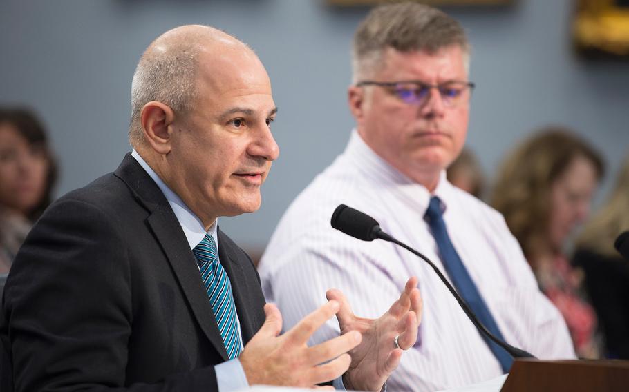 Scott Faber, Senior Vice President for Government Affairs for the Environmental Working Group, testifies during a House Appropriations Subcommittee on Veterans Affairs on Capitol Hill in Washington on Wednesday, March 11, 2020. At right looking on is retired Army helicopter pilot Jim Holmes.