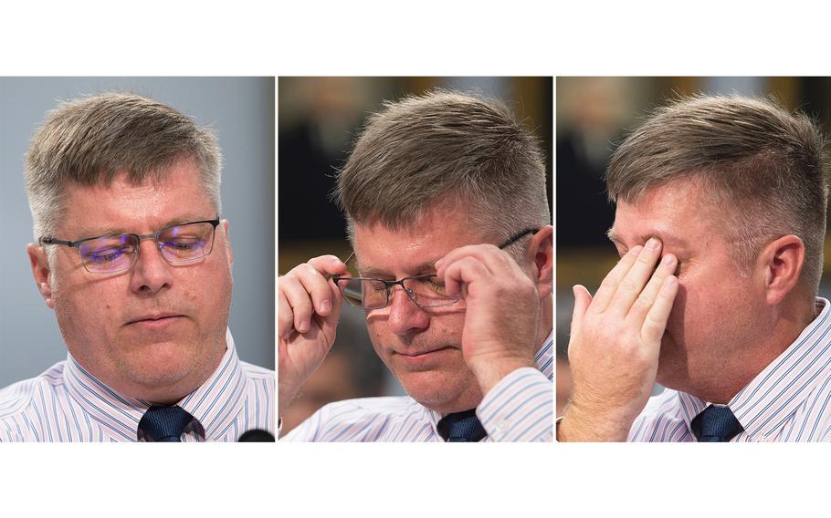 Retired Army helicopter pilot Jim Holmes, who also served in the Air Force, chokes up, removes his glasses and wipes tears from his eyes while testifying before the House Appropriations Subcommittee on Veterans Affairs on Capitol Hill in Washington on Wednesday, March 11, 2020. Holmes said he never imagined that his 17-year old daughter Kaela, who died in March 2019, "would be the one paying the ultimate price" for his service, which exposed his family to toxic base water.