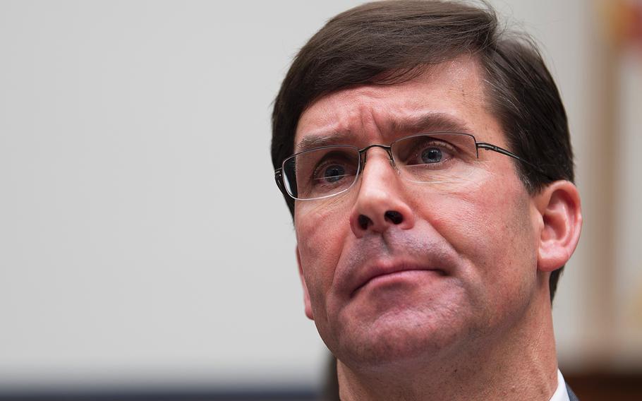 Defense Secretary Mark Esper attends a hearing on Capitol Hill in Washington on Feb. 26, 2020. At the Pentagon Thursday, March 12, Esper said six American service members and seven military dependents have confirmed cases of the coronavirus.