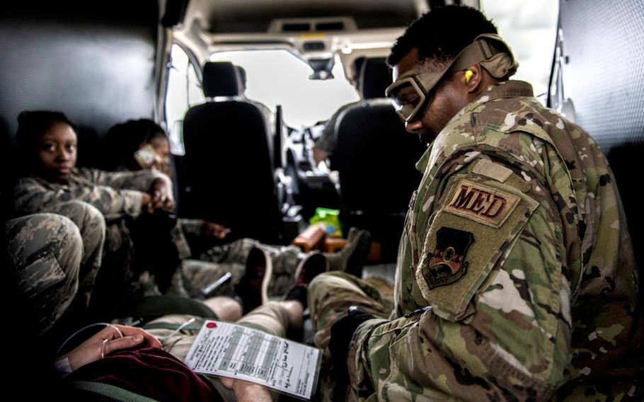 A U.S. Air Force Technical Sgt. Kevin Hopson, 172nd Medical Group, Mississippi Air National Guard, assesses and reviews patient condition during transport during PATRIOT South 2020 at Camp Shelby in Hattiesburg, Miss., Mar. 3, 2020. 