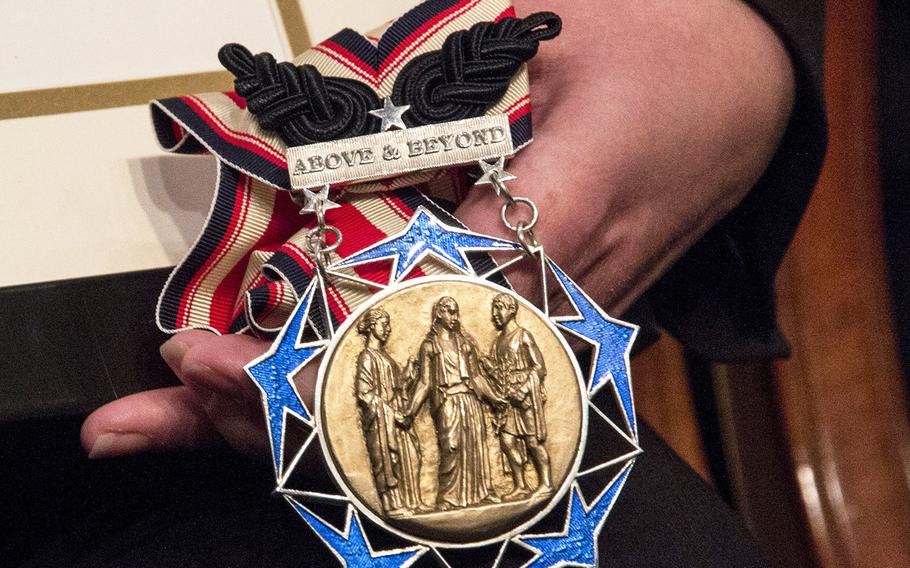A Citizen Honors Award medal, as seen during a ceremony at Arlington National Cemetery on Medal of Honor Day in 2014.