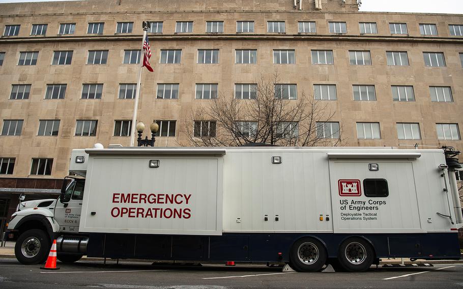 A U.S. Army Corps of Engineers emergency operations vehicle sits parked outside the Government Accountability Office in Washington, D.C., on Saturday, April 4, 2020.