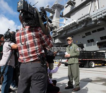 Capt. Brett Crozier speaks to reporters in front of the USS Theodore Roosevelt at Naval Air Station North Island, San Diego, Jan. 17, 2020. 
