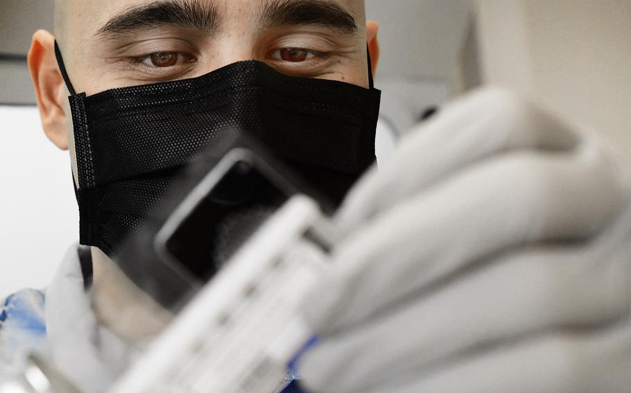 U.S. Air Force Tech. Sgt. Jordan Rigor, 48th Medical Support Squadron conducts COVID-19 testing at RAF Feltwell, England April 9, 2020.