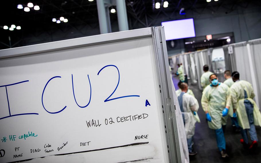 Medical providers assigned to Javits New York Medical Station conduct operations in the facility's intensive care unit, April 13, 2020.