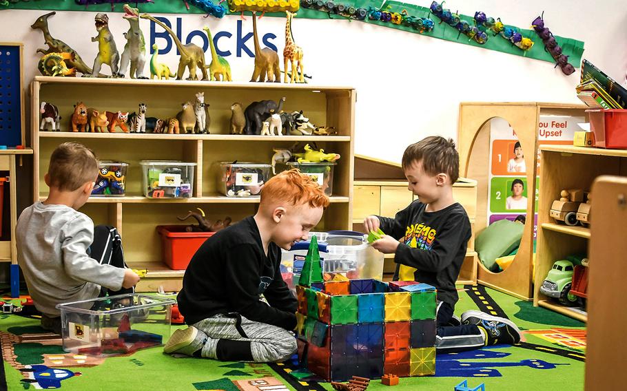 Three boys in the Strong Beginnings program at Fort Carson's Ivy Child Development Center play in the block area March 13, 2020.