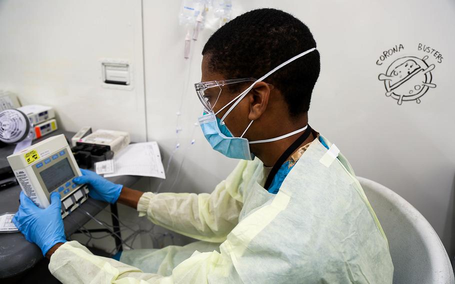 Army Spc. Fredrick Spencer, with the 531st Hospital Center, performs maintenance on an infusion pump at the Javits New York Medical Station, April 16, 2020.