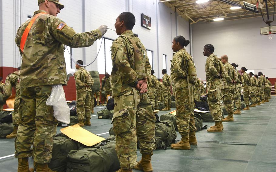 Basic Combat Training recent graduates are screened for COVID-19 upon arrival to Fort Lee, Va., on March 31, 2010.