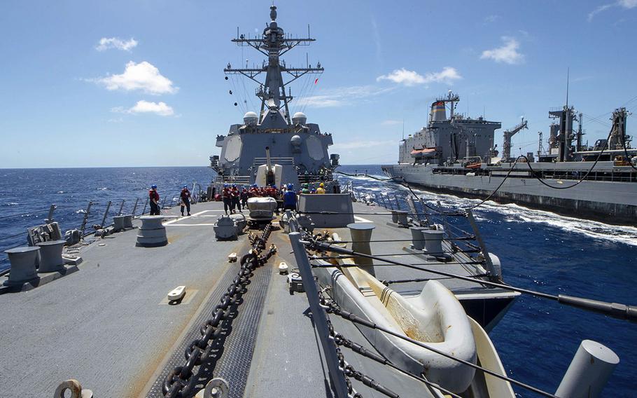 In a March 27, 2020 photo, the Arleigh Burke-class guided-missile destroyer USS Kidd receives fuel from the Military Sealift Command replenishment oiler USNS Guadalupe while conducting routine operations in the eastern Pacific.