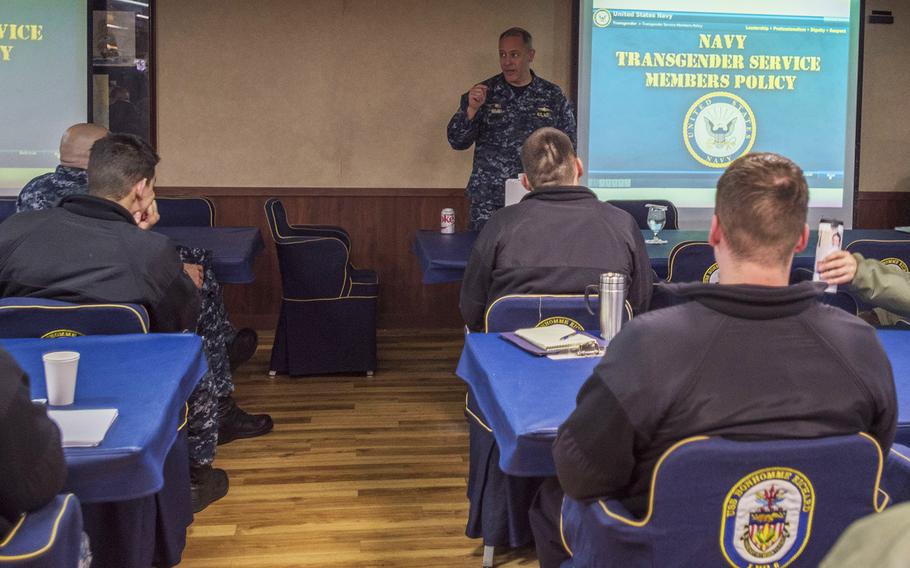 In a Jan. 25, 2017 photo, Capt. Jeffrey Ward, commanding officer of amphibious assault ship USS Bonhomme Richard, facilitates transgender training with chiefs and officers in the ship's wardroom at Sasebo, Japan.