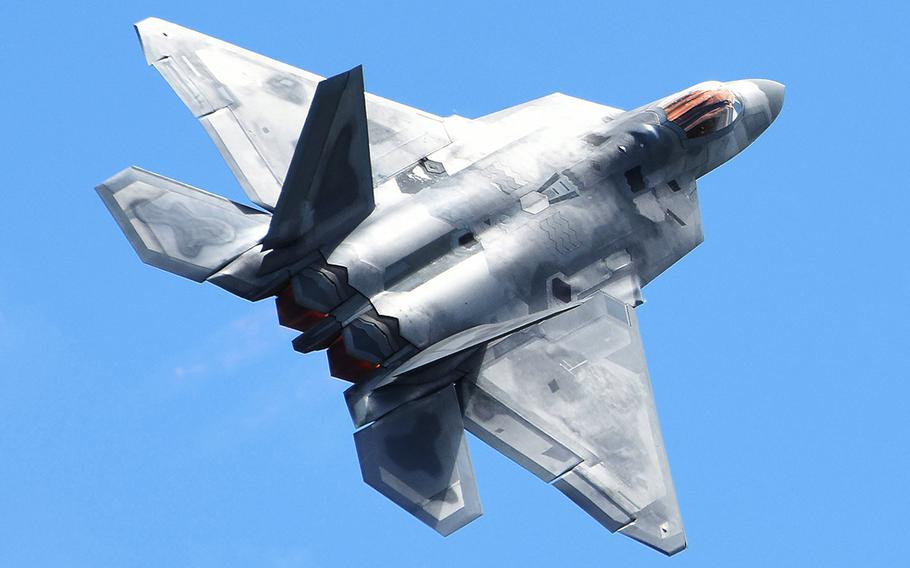 U.S. Air Force Maj. Paul Lopez, F-22 Demo Team commander, performers aerial maneuvers July 14, 2019, at the "Mission Over Malmstrom" open house event on Malmstrom Air Force Base, Mont.