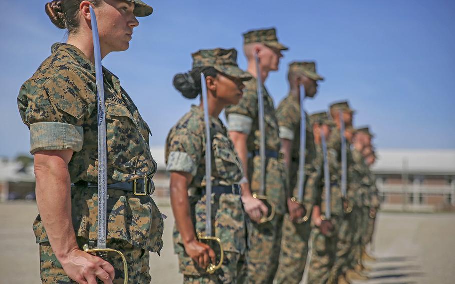 Marine instructors with Drill Instructor School aboard Marine Corps Recruit Depot Parris Island instruct and mentor Drill Instructor School candidates during close-order drill practice on Parris Island, S.C., on April 17, 2019.