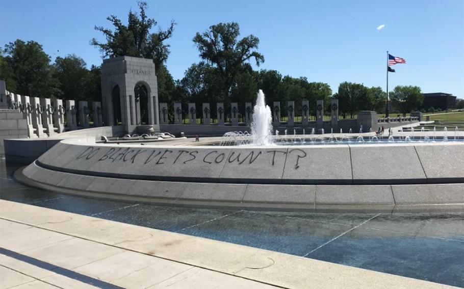 A photo shared on Twitter by the Friends of the National World War II Memorial shows vandalism to the monument on the National Mall in Washington, D.C.
