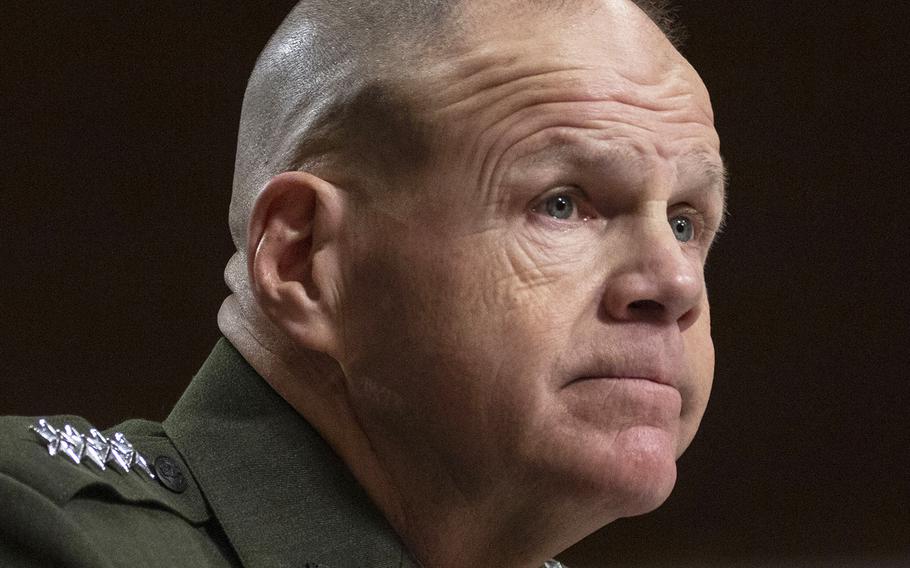 Former Marine Corps commandant Gen. Robert Neller, shown here at a Senate hearing i n 2017, says everyone "must stand up for what is right and reasonable."