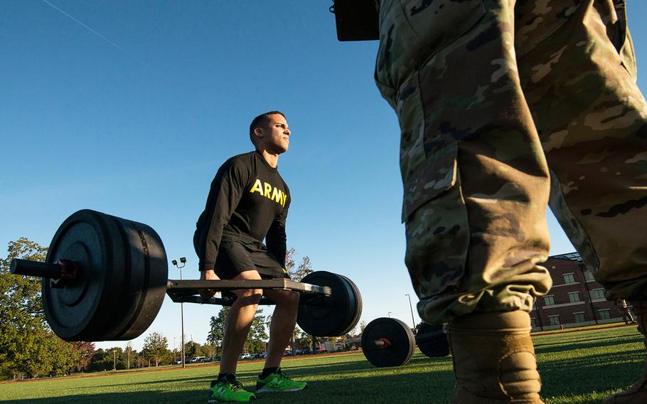 In an Oct. 23. 2018 photo, a soldier with the 128th Aviation Brigade at Fort Eustis, Va., attempts the deadlift during a demonstration of the Army’s new Army Combat Fitness Test.