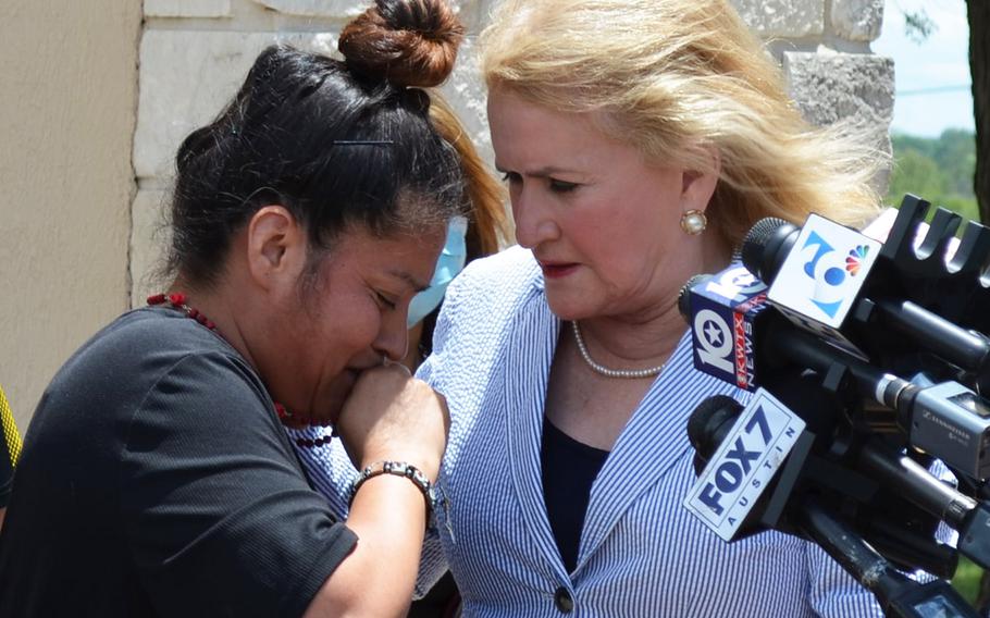 Rep. Sylvia Garcia, D-Texas, comforts Gloria Guillen, the mother of missing Fort Hood soldier Pfc. Vanessa Guillen, during a news conference on June 23, 2020 outside the main entrance to Fort Hood, Texas.