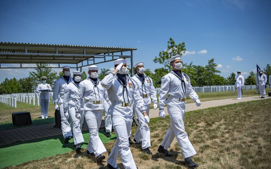 The U.S. Navy Ceremonial Guard and the 3d U.S. Infantry Regiment (The Old Guard) Caisson Platoon conduct military funeral honors with modified escort for U.S. Navy Cmdr. Jesse W. Lewis, Jr. at Arlington National Cemetery, Arlington, Virginia, on June 29, 2020.