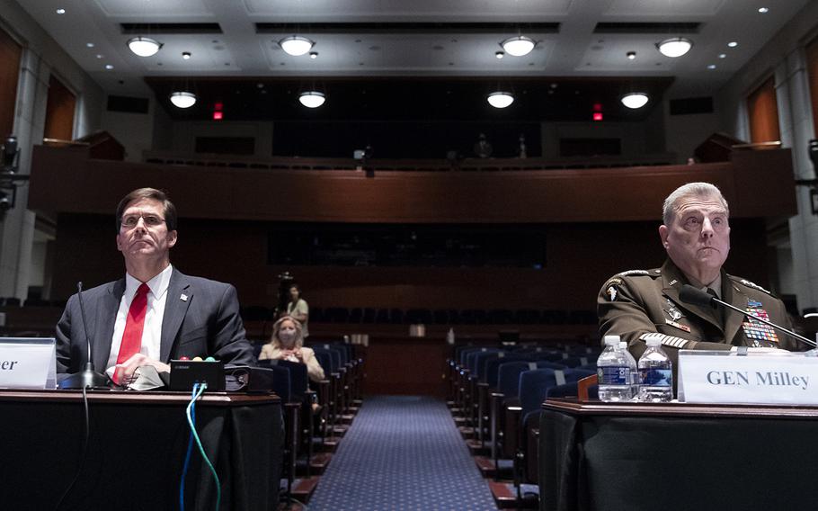 Defense Secretary Mark Esper, left, and Chairman of the Joint Chiefs of Staff Gen. Mark Milley appear during a House Armed Services Committee hearing on Thursday, July 9, 2020, on Capitol Hill in Washington. 