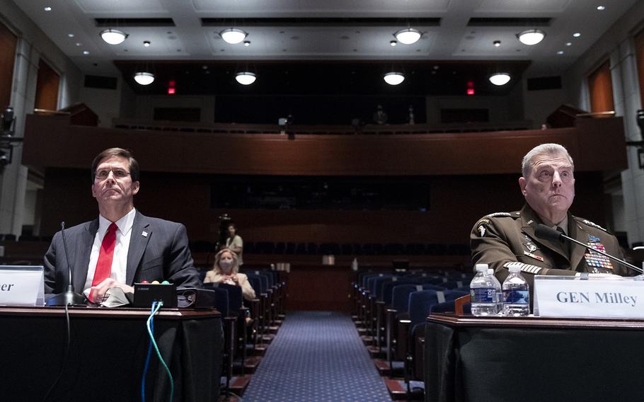 Defense Secretary Mark Esper, left, and Chairman of the Joint Chiefs of Staff Gen. Mark Milley appear during a House Armed Services Committee hearing on Thursday, July 9, 2020, on Capitol Hill in Washington.