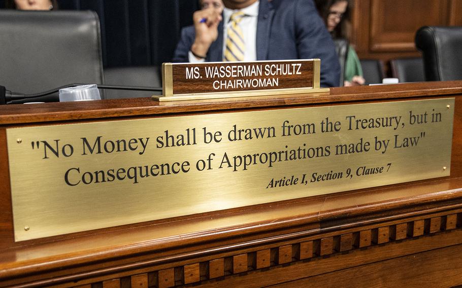 A plaque in the House Appropriations Committee hearing room on Capitol Hill during a subcommittee meeting in 2019.