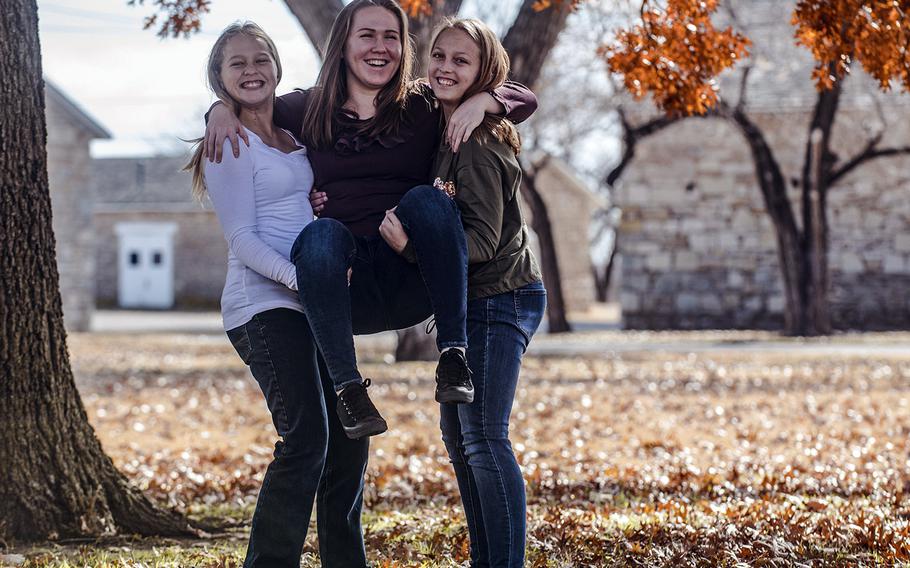 Anna Carter, 13, seen on the right with her sisters Corinne, left, and Sophia, was the first pediatric case of coronavirus to lead to death in Oklahoma. The middle of five children, Anna’s father is a Marine stationed at Fort Sill, Okla. 