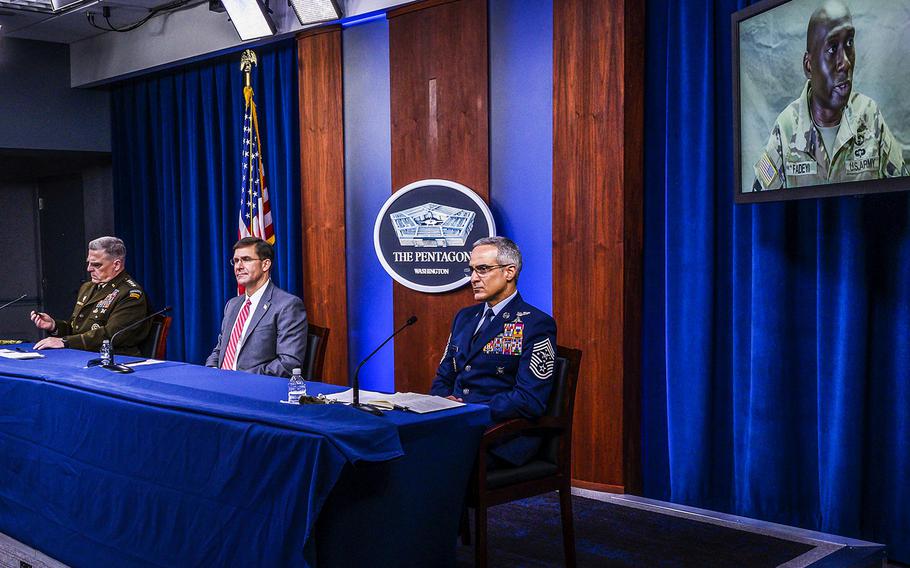 Chairman of the Joint Chiefs of Staff Army Gen. Mark A. Milley, Defense Secretary Dr. Mark T. Esper and Senior Enlisted Advisor to the Chairman Ramón “CZ” Colón-López hold a virtual global town hall to answer questions from service members, Defense Department civilians and family members at the Pentagon, July 17, 2020.