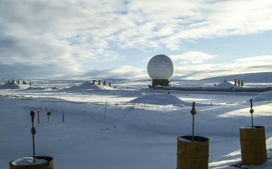 This white golf ball like structure houses one of several radars that scan the skies for foreign military rockets and missiles at Thule Air Base, Greenland.