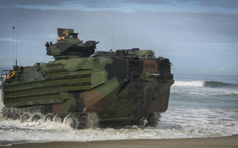 Marines with 15th Marine Expeditionary Unit land ashore on amphibious assault vehicles during training at Camp Pendleton, Calif., in 2017. 