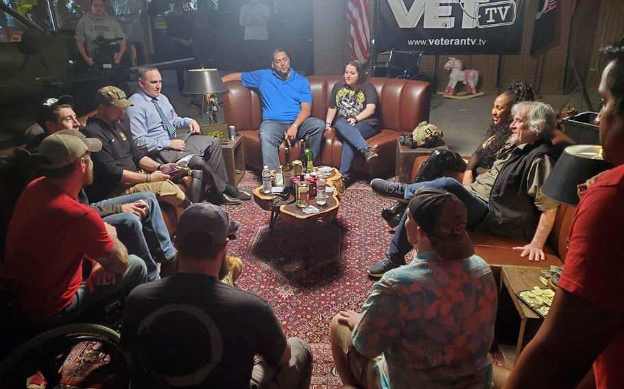 Army veteran Vanessa Brown, center, is pictured in early 2020 with other cast members and the crew of "Veterans Laughing Together," a documentary series launched in July on the video-on-demand channel VET-Tv. Brown, the only female combat-wounded veteran on the show, was 'the hardest' of them all, said retired Army Special Forces member Nathan Smith to her left, wearing a tie.