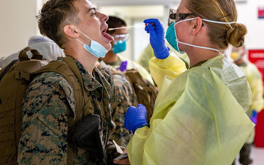 U.S. Marines with Marine Rotational Force-Darwin arrive at the Royal Australian Air Force Base Darwin, NT, Australia, July 24, 2020. The Marines underwent biosecurity testing, as well as testing for COVID-19, before being transported to their quarantine quarters. 