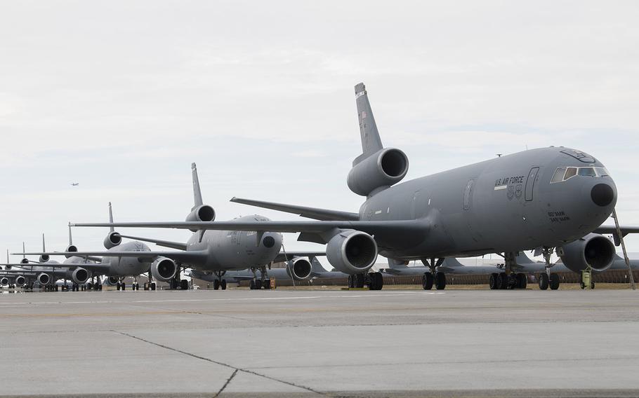 U.S. Air Force KC-10 Extenders from Travis Air Force Base, California, sit on the flightline at Fairchild Air Force Base, Wash., Aug. 20, 2020. The KC-10s and airmen were evacuated from Travis due to the LNU Lightning Complex Fire.