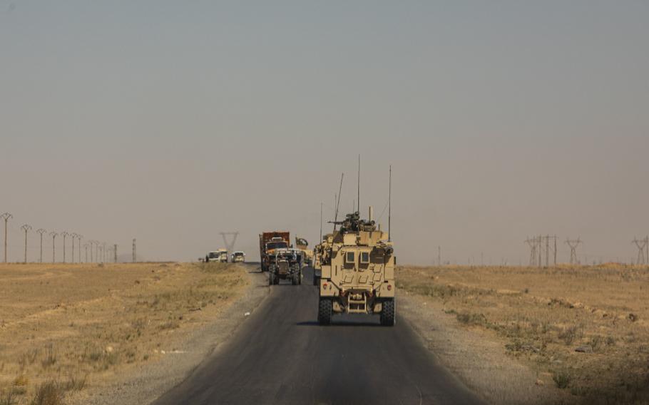 U.S. Marines with Special Purpose Marine Air-Ground Task Force – Crisis Response – Central Command, and U.S. Army soldiers with 2nd Brigade Combat Team, 82nd Airborne Division, conduct a joint security patrol in Syria, Aug. 23, 2020. 