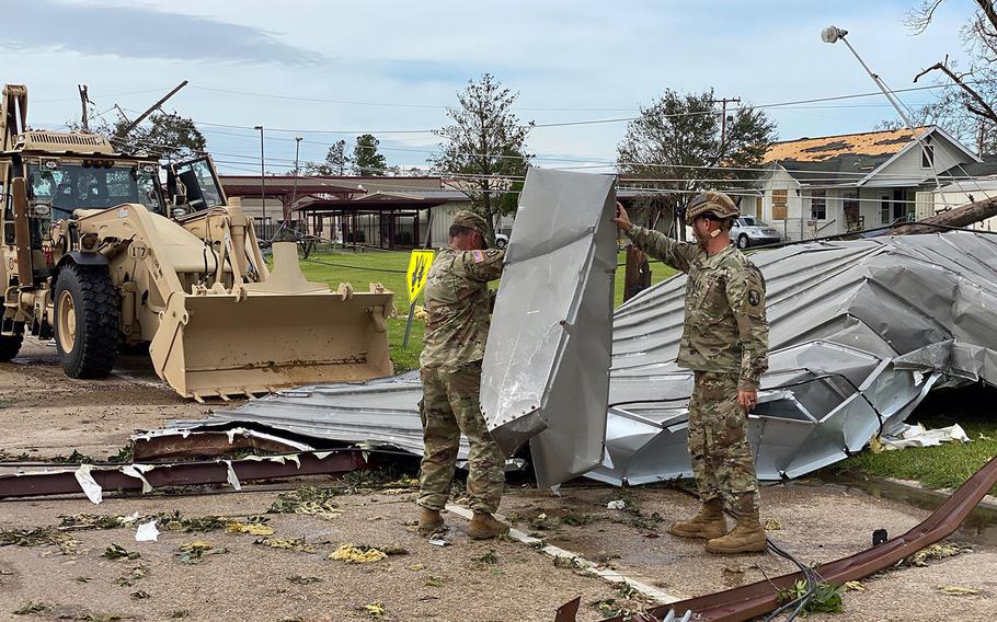 Louisiana National Guard members deploy to clear roads in Lake Charles and begin to assess the damage from Hurricane Laura on Thursday, Aug. 27, 2020.