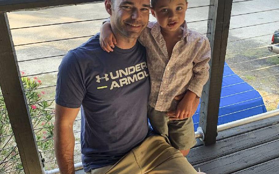 Master Sgt. William Rotroff, an F-35 integrated section chief with the 756th Aircraft Maintenance Squadron, with his son, Chevvy, in April in Jacksonville, Fla. Rotroff recently received the first approved application for a court-ordered child custody assignment and is scheduled to join his son in Florida this fall. 
