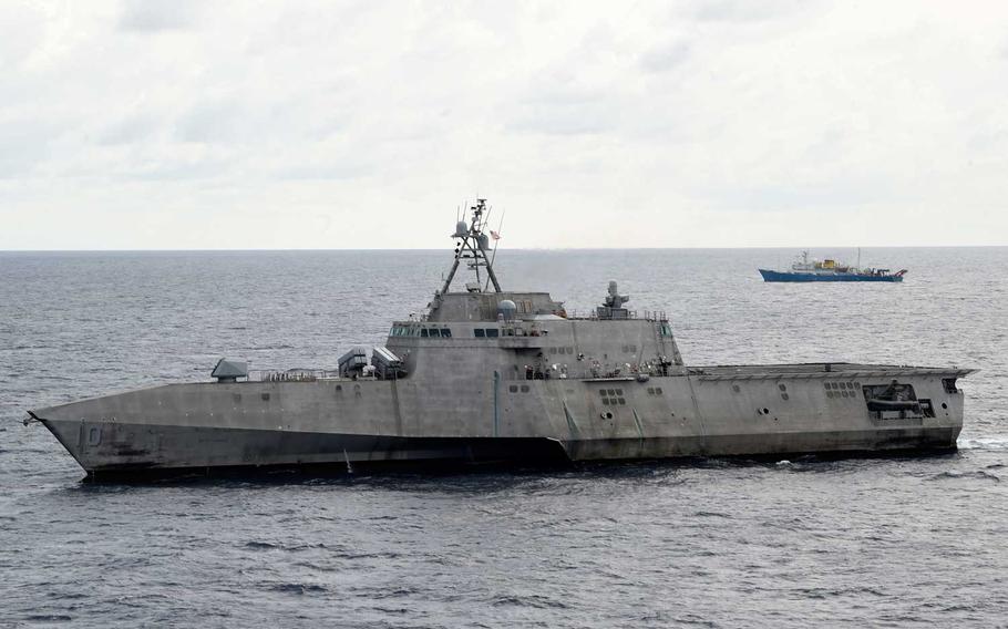 The Independence-variant littoral combat ship USS Gabrielle Giffords (LCS 10), left, conducts routine operations in the vicinity of the Chinese vessel Hai Yang Di Zhi 4 Hao, July 1, 2020. 