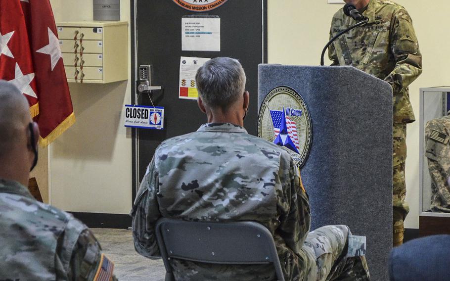 Maj. Gen. John Richardson formally stepped into the role of acting Fort Hood commander and deputy commander of III Corps as his predecessor Maj. Gen. Scott Efflandt sits in the front row during a ceremony Wednesday to mark the occasion. Efflandt will remain at the Texas base while a series of investigations look into his handling of the disappearance and death of Spc. Vanessa Guillen.