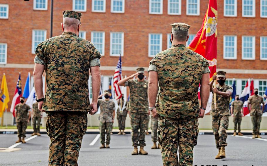 U.S. Marines with Marine Corps Intelligence Activity, Marine Corps Base Quantico, participate in a change of command ceremony, June 19, 2020 aboard MCB Quantico, Virginia. Change of command ceremonies are an established tradition within the Marine Corps that mark the beginning and ending of a successful tour of leadership.