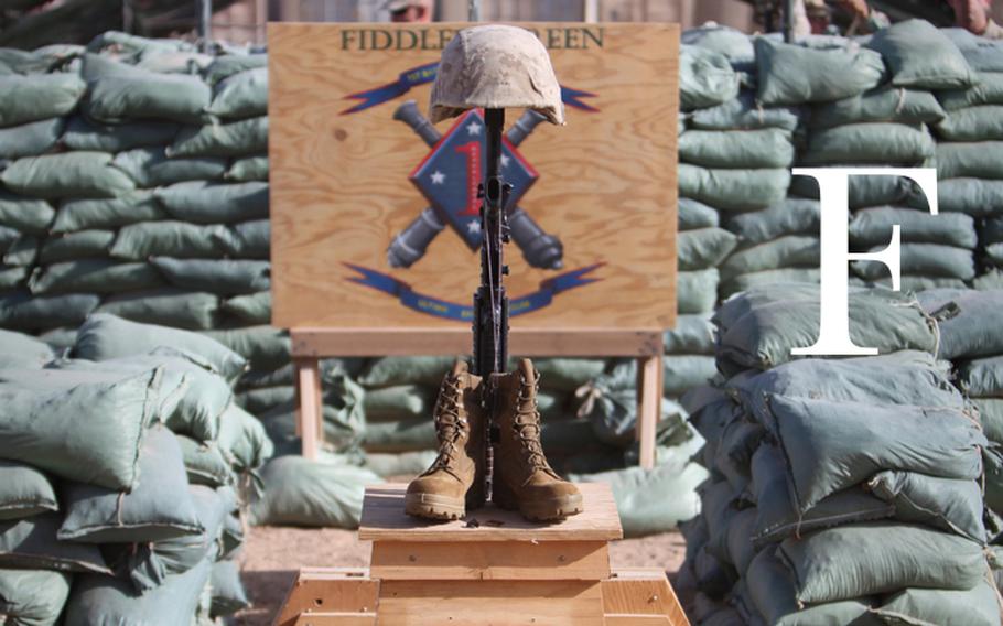 A memorial to U.S. Marine Corps Sgt. Ronald A. Rodriguez stands at Firebase Fiddler's Green in Helmand province, Afghanistan, Aug. 30, 2010. Rodriguez, assigned to the 1st Battalion, 11th Marine Regiment, was killed in action a week earlier. 