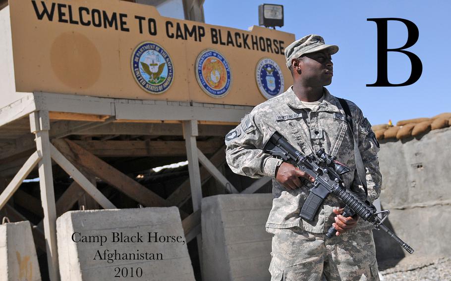Spc. Robert Whitehead, of Purvis, Miss., a security guard for Headquarters Support Company of the 101st Airborne Division (Air Assault), stands guard near the entrance to Camp Black Horse, Oct. 10. Whitehead and other soldiers from the 101st provide security and sustainment support services for more than 700 U.S. and coalition forces who reside on the camp.