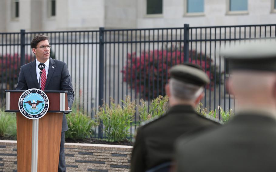 Defense Secretary Mark Esper speaks during the Pentagon's 9/11 observance ceremony in the National 9/11 Pentagon Memorial located across from the site of the attack on Friday, Sept. 11, 2020.