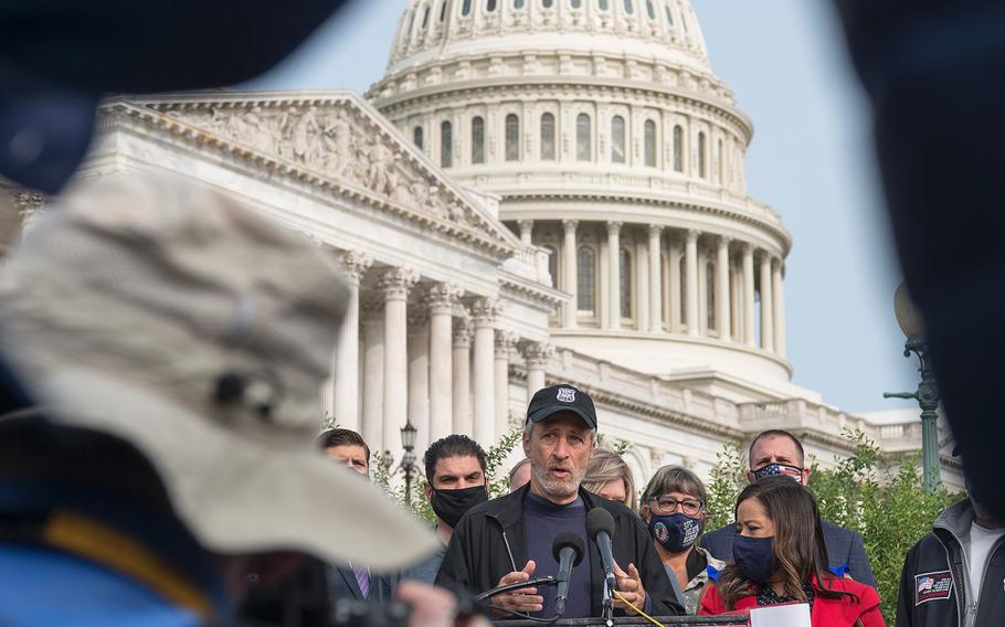 Comedian Jon Stewart speaks in front of the U.S. Capitol in Washington on Tuesday, Sept. 15, 2020, as advocates lobby for legislation that would provide benefits to military veterans who have been exposed to toxins from burn pits used at overseas locations.