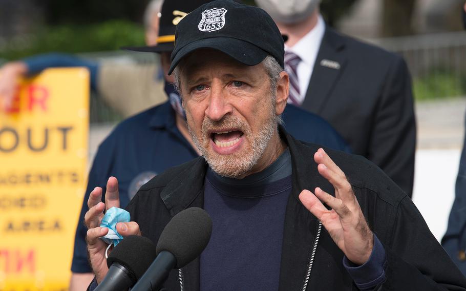 Comedian Jon Stewart speaks in front of the U.S. Capitol in Washington on Tuesday, Sept. 15, 2020, as advocates lobby for legislation that would provide benefits to military veterans who have been exposed to toxins from burn pits used at overseas locations.