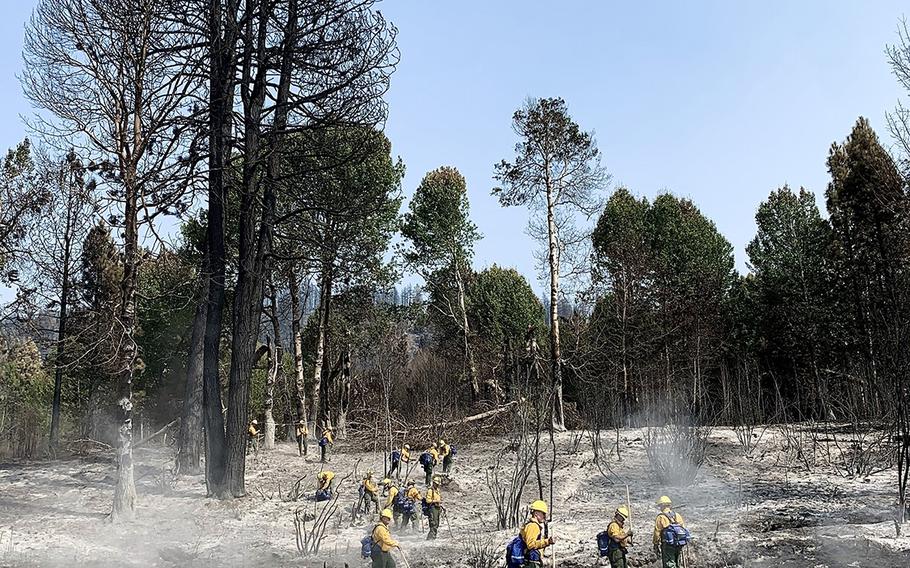 Oregon National Guard members conduct mop-up operations in Chiloquin, Ore., on Sept. 14, 2020. About 1,200 Oregon Guard members are supporting overall firefighting efforts with aviation and ground crews, in addition to supporting county liaison teams and Oregon State Police with traffic control points and fatality search-and-rescue operations. 