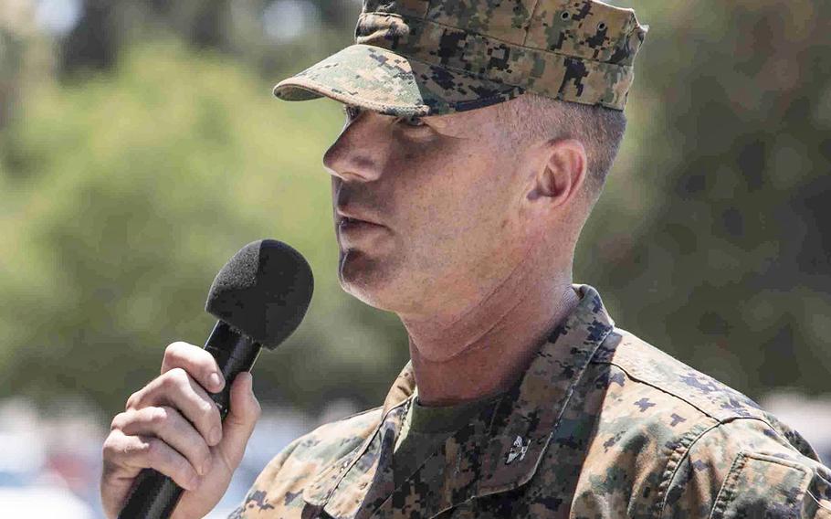 In a July 14, 2017 photo, U.S. Marine Corps Col. Stephen Keane, incoming commanding officer of Security and Emergency Services Battalion, speaks during a change of command ceremony aboard Camp Pendleton, Calif.